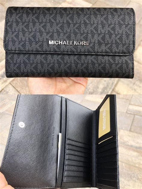 michael kors jet set travel black leather wallet|Michael Kors dark cherry wallet.